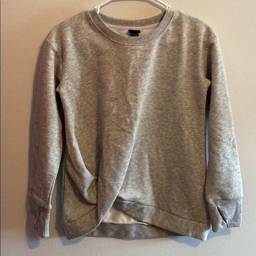 Grey women’s workout crew neck pullover, size large fits like a small never worn